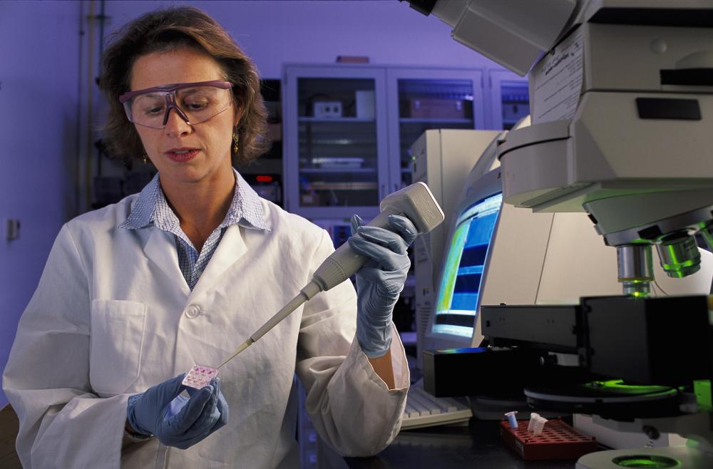 A 2002 photo of then-NIST biomedical engineer Laurie Locascio placing a water sample on a highly sensitive, inexpensive "lab-on-a-chip" that provides warning within seconds of even trace amounts of toxic chemicals in water.