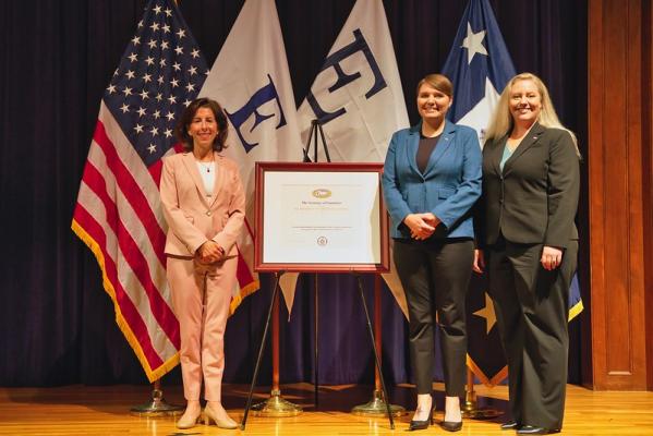 U.S. Secretary of Commerce Gina Raimondo presents Truckee Meadows Community College, Reno, Nevada the E-Award for Exports for demonstrating a sustained increase in export sales over a four-year period.