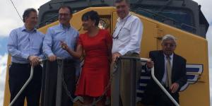 Secretary of Commerce Penny Pritzker joined U.S. and Mexican government leaders in Brownsville, Texas on the front of a locomotion engine