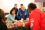 Commerce Secretary Gina Raimondo at the Good Success Church helping distribute food to the community