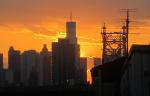 Graphic of skyscrapers and the Queensborough Bridge at sunset in New York City