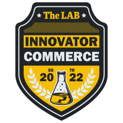 The LAB's Innovator badge in black and yellow with a beaker representing the badge and wild olive leaves representing the department. 