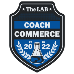 The LAB's Coach badge in black and blue and white with a beaker representing the badge and wild olive leaves representing the department. 