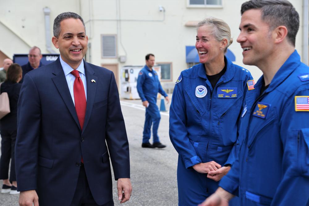 Deputy Secretary Graves Meets with NOAA Rear Adm. Nancy Hann, Director, Office of Marine and Aviation Operations and Caption Chris Kerns at Reagan National Airport