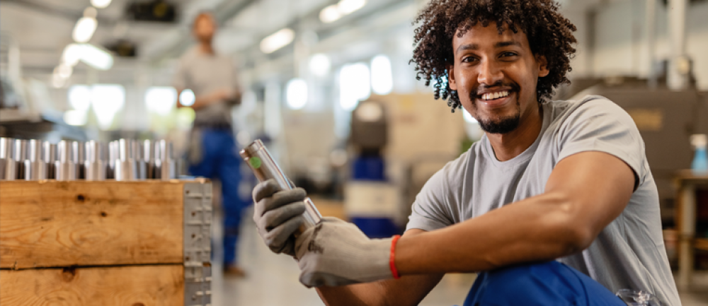 Photo of a manufacturing worker: Credit: iStock/Drazen Zigic