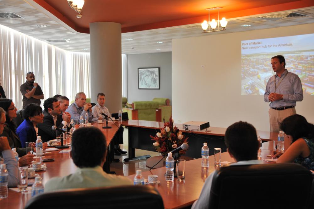Secretary Pritzker (left) learns about plans for developing Mariel Port in Cuba