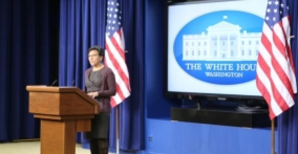Secretary Penny Pritzker standing at a White House podium