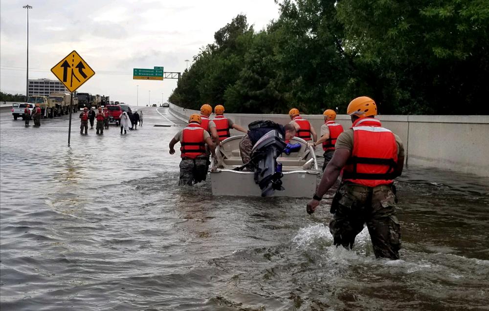 Texas National Guard soldiers arrive in Houston to aid residents in heavily flooded areas from the storms of Hurricane Harvey, August 27, 2017 (Texas Army National Guard/1st Lt. Zachary Wes)