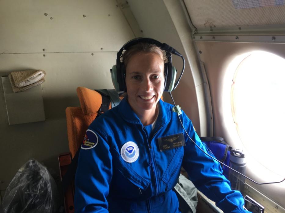 NOAA Meteorologist and Flight Director Jessica Williams aboard NOAA Lockheed WP-3D Orion N43RF during a flight into Hurricane Matthew in October 2016.