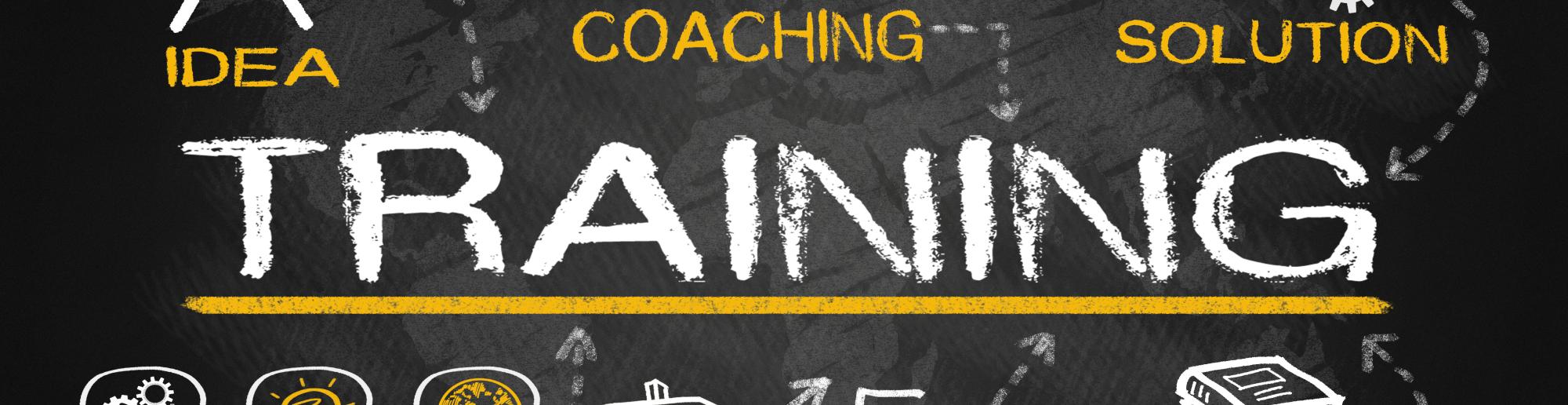 An image of blackboard with the word Training in the middle surrounded by another icon: idea, coaching, solution, learn, direction, knowledge