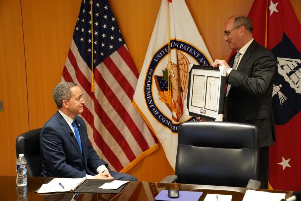 Drew Hirshfeld presents Deputy Secretary Graves with a copy of his ancestor’s patent. Photo by Jay Premack/USPTO