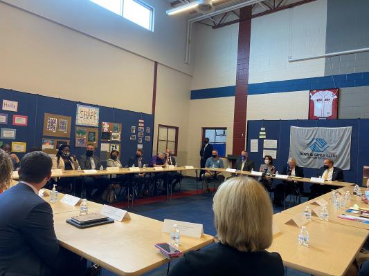 Commerce Secretary Gina Raimondo and Rhode Island Senator Jack Raimondo at a roundtable discussion with caregivers, workforce development experts, innovators, and community and business leaders at the Boys and Girls Club in Pawtucket, Rhode Island