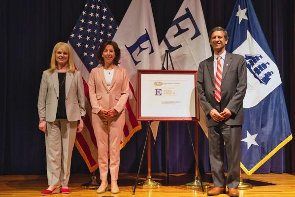 U.S. Secretary of Commerce Gina Raimondo presents Fisher College of Business, The Ohio State University with the E-Star Award which recognizes previous “E” Awardees that have reported four years of additional export growth.