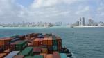 Cargo ship safely entering the port of Miami in Florida. 