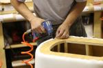 Photo of a Custom Contract Furnishings (CCF) worker making upholstered seating for the hospitality, health care and senior living industries. 