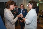 Secretary Raimondo greets Kim Howell, master of ceremonies for the Entrepreneurship Essentials Workshop and Resource Fair, and U.S. Coast Guard spouse.