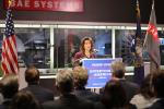 U.S. Commerce Secretary Raimondo addresses an audience during a visit to BAE Systems in Nashua NH